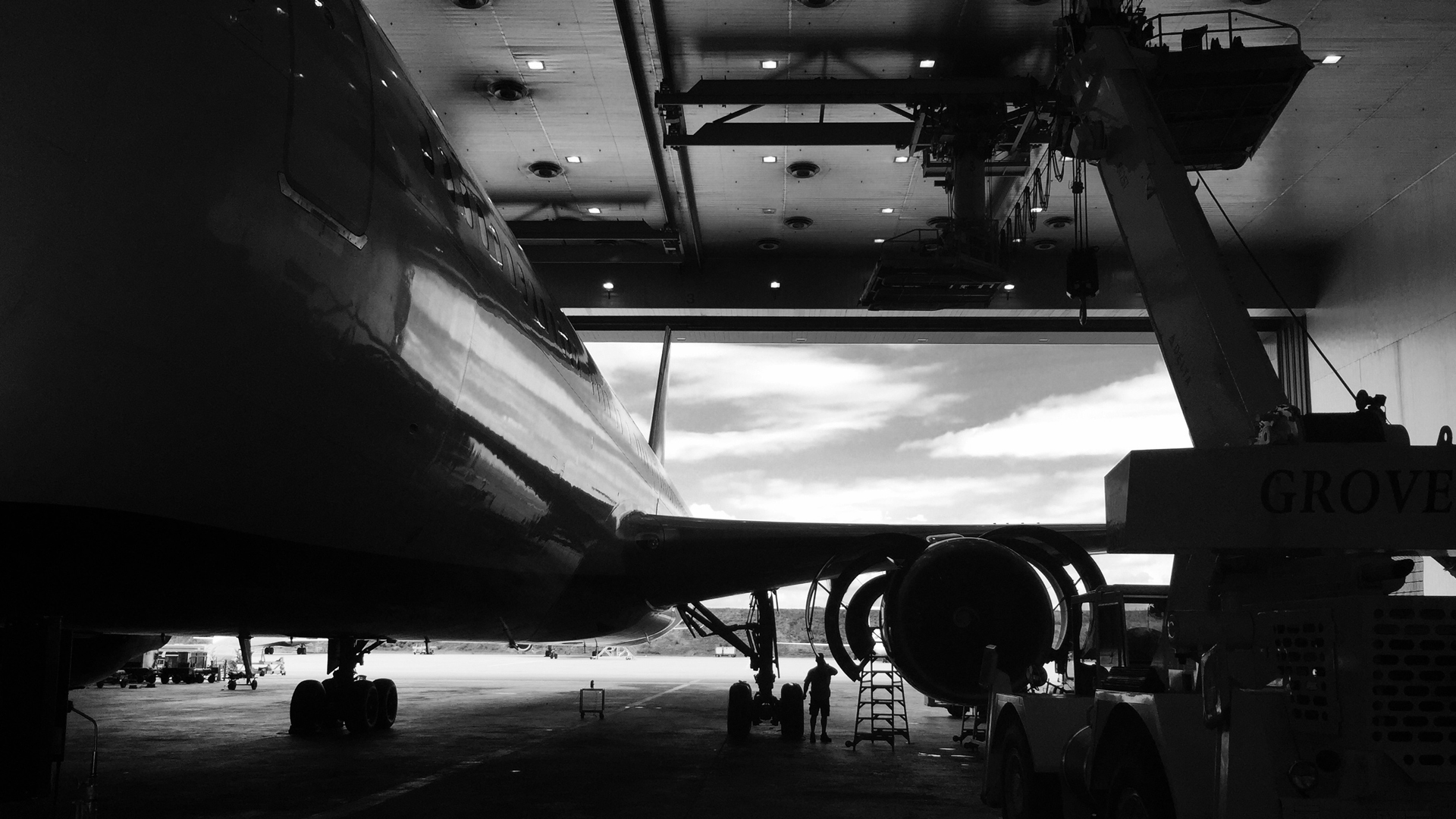 Commercial aircraft inside a maintenance hangar